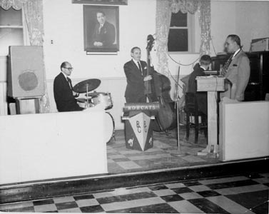 Dad (Robert) the saxaphone player, with his band at Sons of Italy Club. This is also the place that he died on June 7, 1964 during cousin Dr. Bobby Capizzi graduation party from Medical School. He was doing what he loved to do---play music.